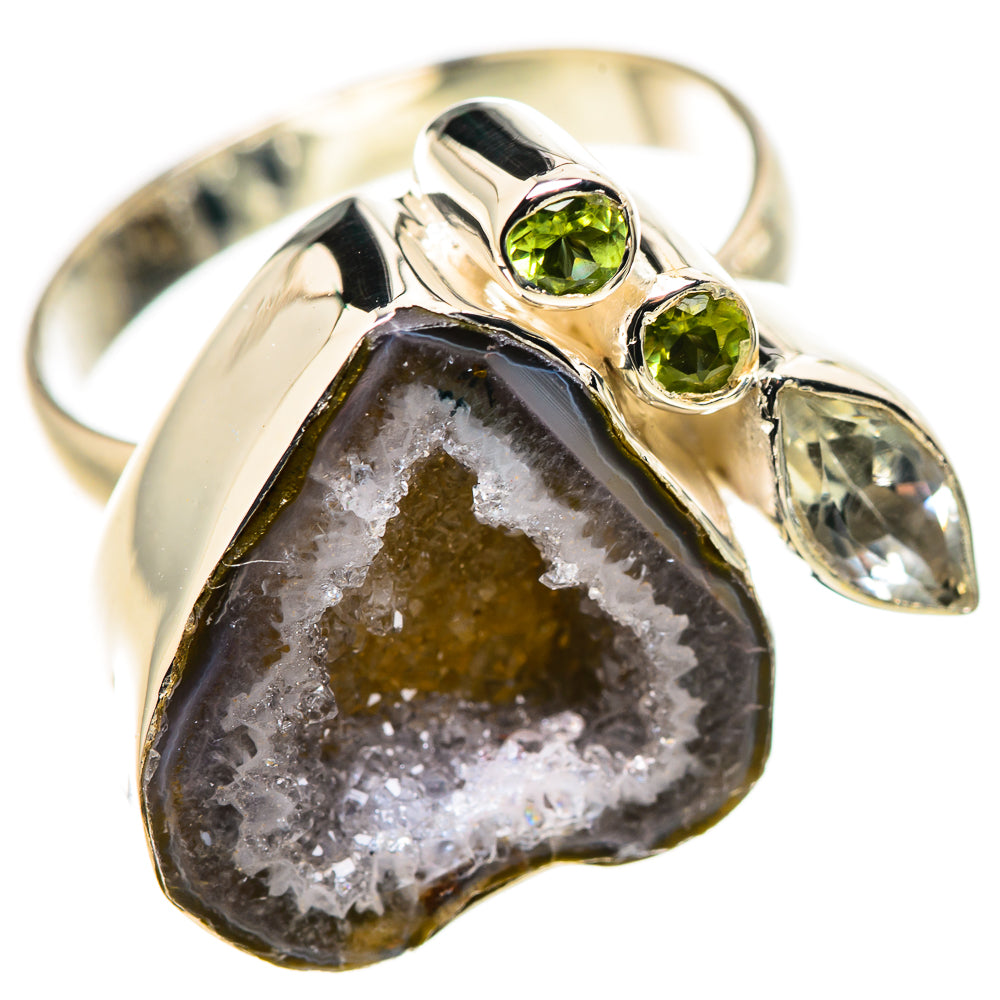 Silver geode druzy ring with peridot green stones and oval clear quartz details