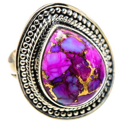 Purple oval cabochon ring in silver with detailed beaded edge and gold matrix