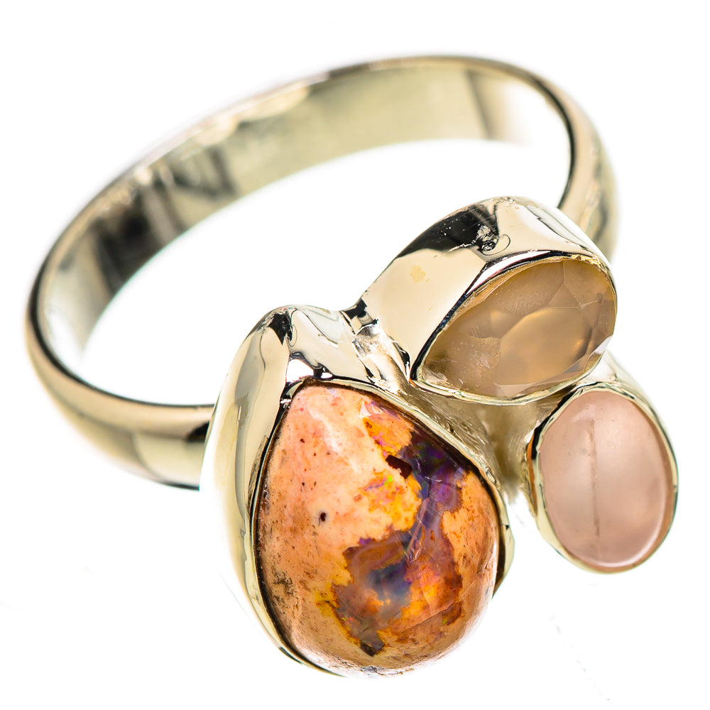 Sterling silver ring with oval fire opal and two pale pink rose quartz stones
