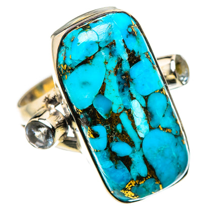 Turquoise cabochon ring in silver with gold speckled matrix and small round accent.