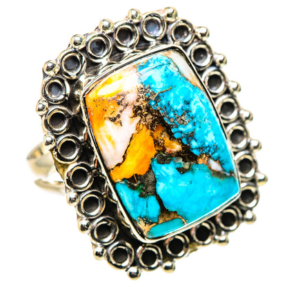 Sterling silver ring featuring a rectangular turquoise spiny oyster cabochon with gold accents