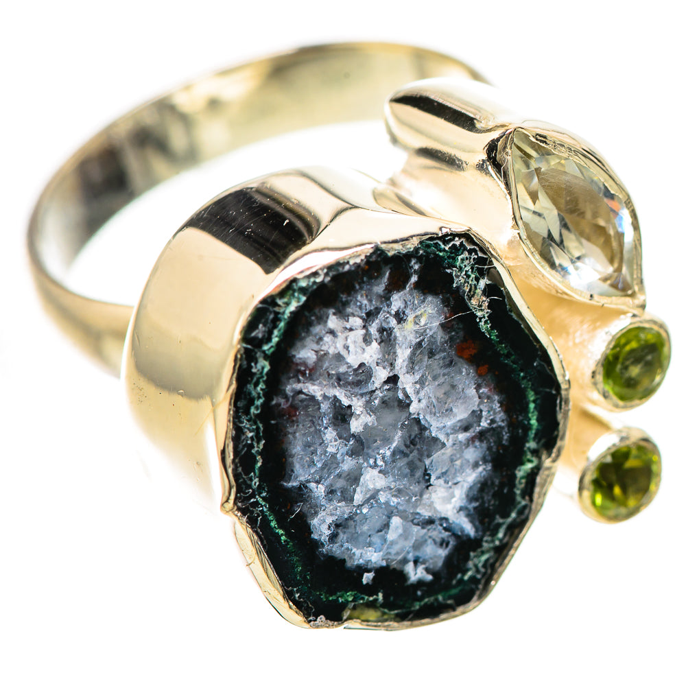 Sterling silver ring with dark blue druzy geode center and two green peridot accents