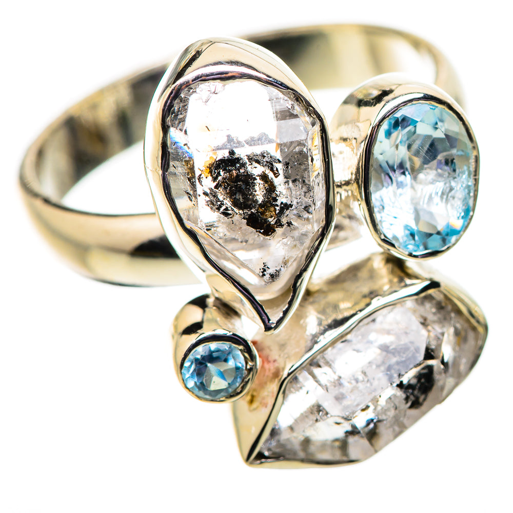 Sterling silver ring with blue topaz oval stones and clear herkimer diamond bezel settings