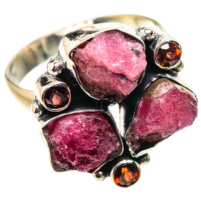 Sterling silver ring with rough pink tourmaline and red garnet bezel stones