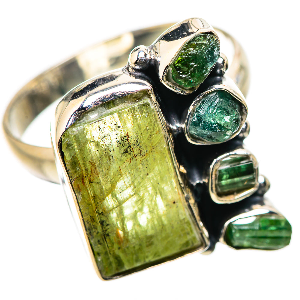 Sterling silver ring with large green tourmaline and smaller green stones, bezel set