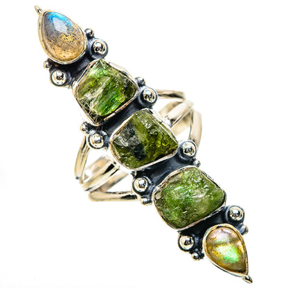 Sterling silver ring with rough green gemstones and blue-gold teardrop accent