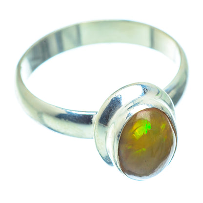 Sterling silver ring with oval Ethiopian opal cabochon, green-orange