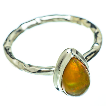 Sterling silver opal ring with oval green-orange Ethiopian opal, textured band view