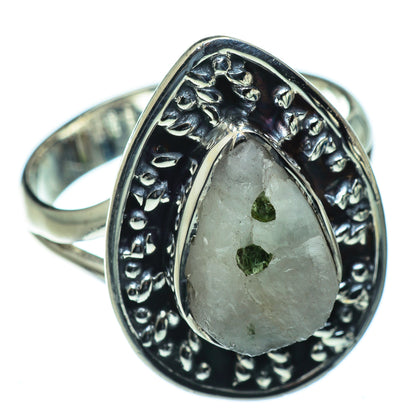 Sterling silver ring with oval gray quartz center and green tourmaline specks