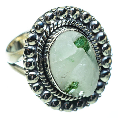 Sterling silver ring with oval pale green quartz and green tourmaline accents, beaded bezel