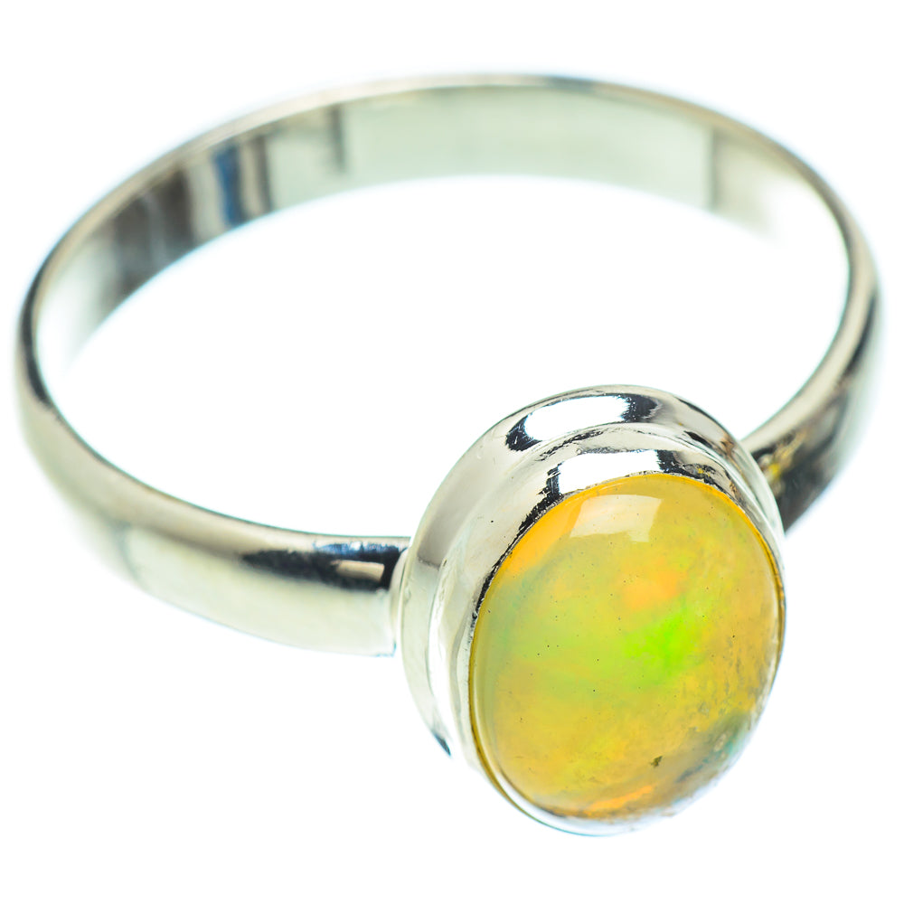 Sterling silver opal ring with round yellow-green cabochon gemstone, size 9.75