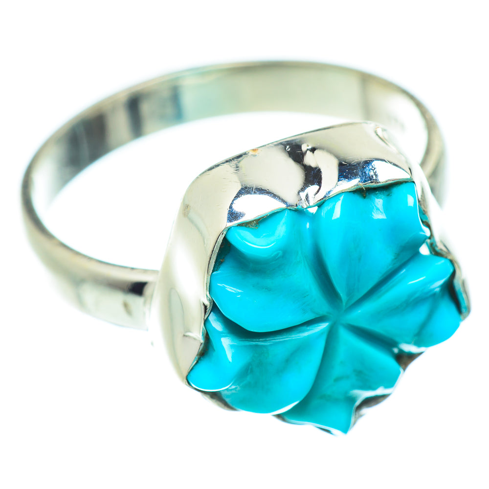 Turquoise carved flower ring in sterling silver, oval face with raised metal edges
