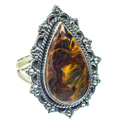 Sterling silver pietersite ring with large teardrop amber-gold gemstone setting