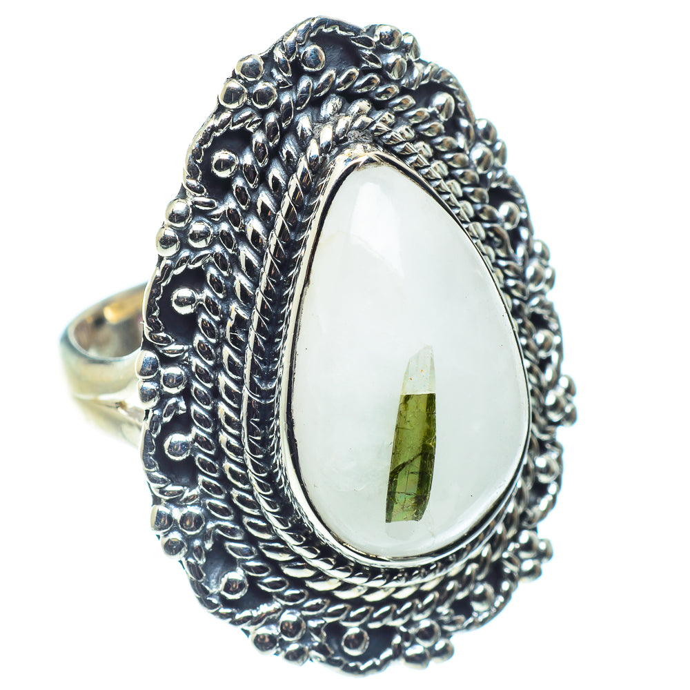Sterling silver statement ring with oval white stone and green tourmaline inclusion