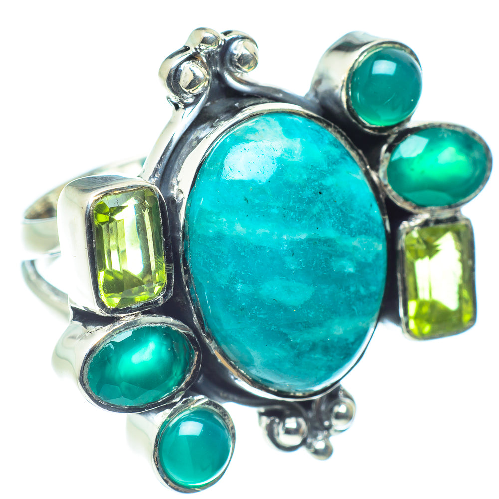 Sterling silver ring with oval turquoise-green stone, set with green round and square gems