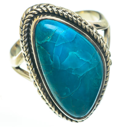 Chrysocolla ring with teal oval stone, rope-textured silver frame, openwork band