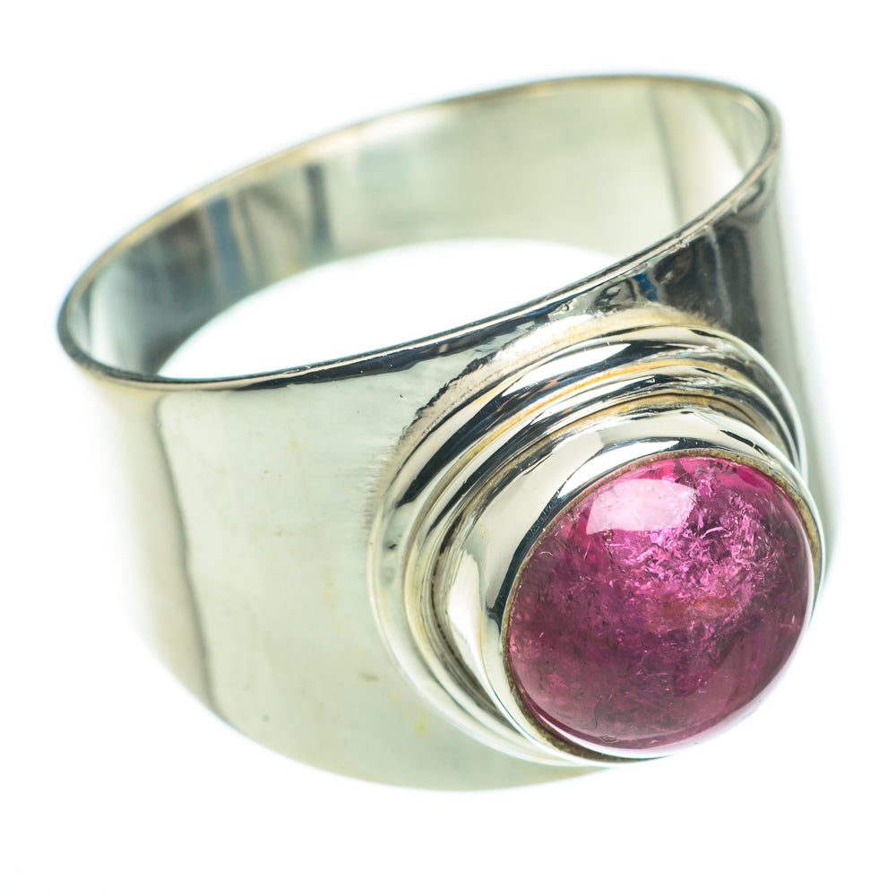 Sterling silver ring with pink tourmaline oval set in swirl bezel