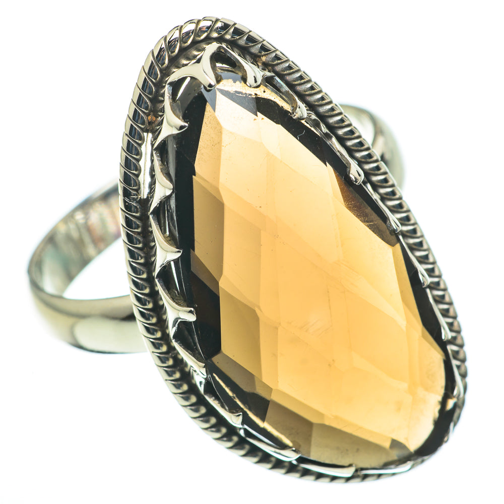 Sterling silver gemstone ring with large yellow faceted oval stone in rope bezel setting