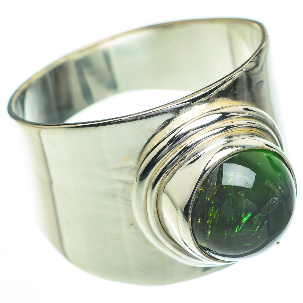 Sterling silver ring with round green tourmaline cabochon in swirl bezel setting