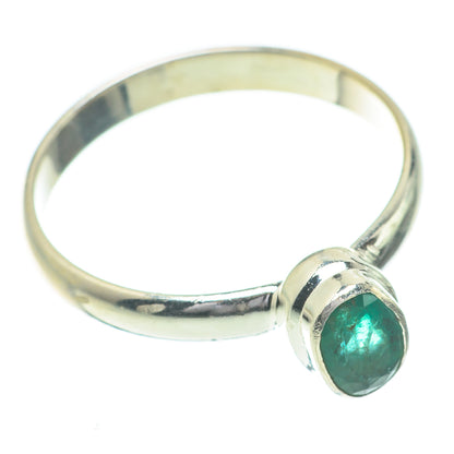 Sterling silver ring with oval green gemstone bezel