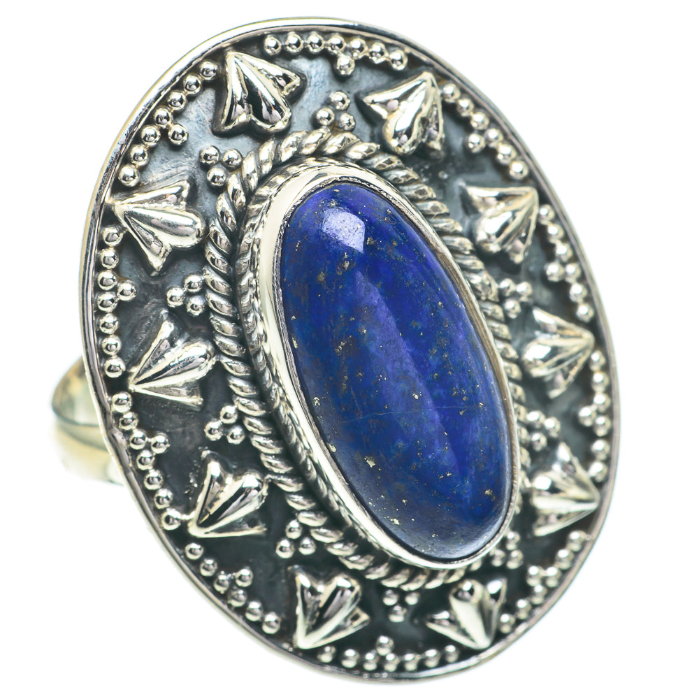 Lapis lazuli oval ring in silver-toned setting with ornate raised borders