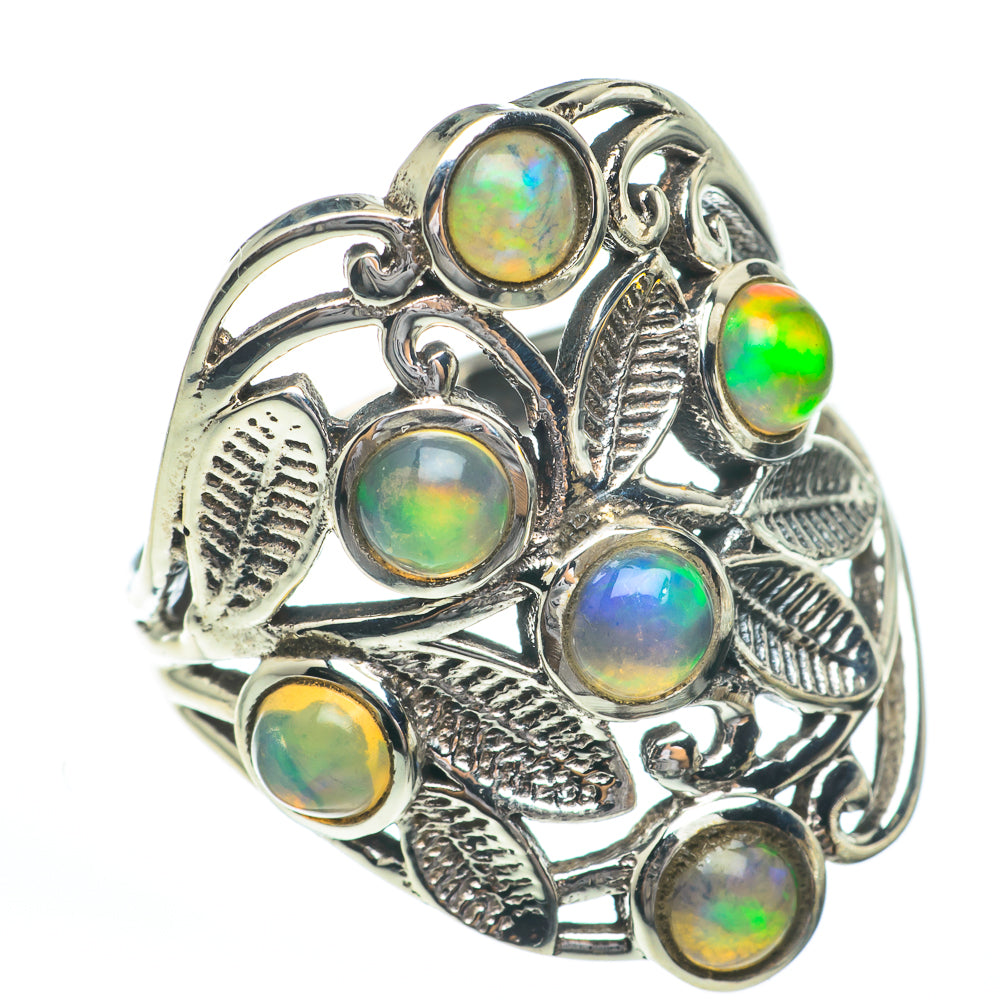 Sterling silver opal-style ring with round stones and embossed leaf details