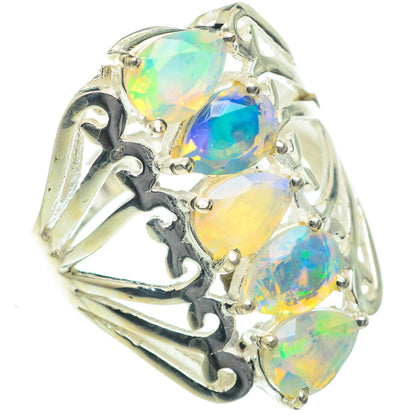 Sterling silver opal ring with three oval Ethiopian opal stones, faceted and prong-set