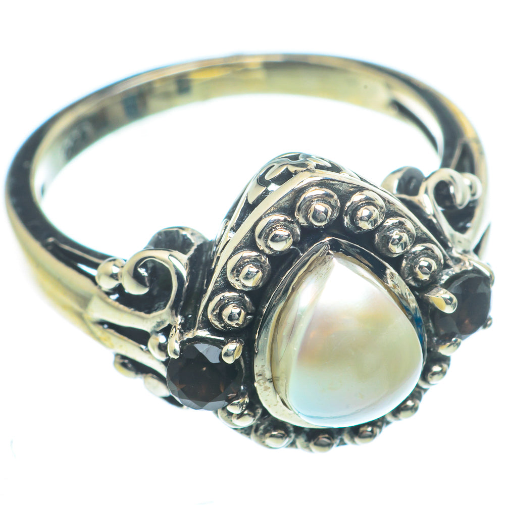 Sterling silver ring with cultured pearl and smoky quartz, ornate bezel setting.