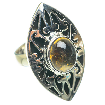 Sterling silver citrine ring with oval amber stone and leafy side engravings