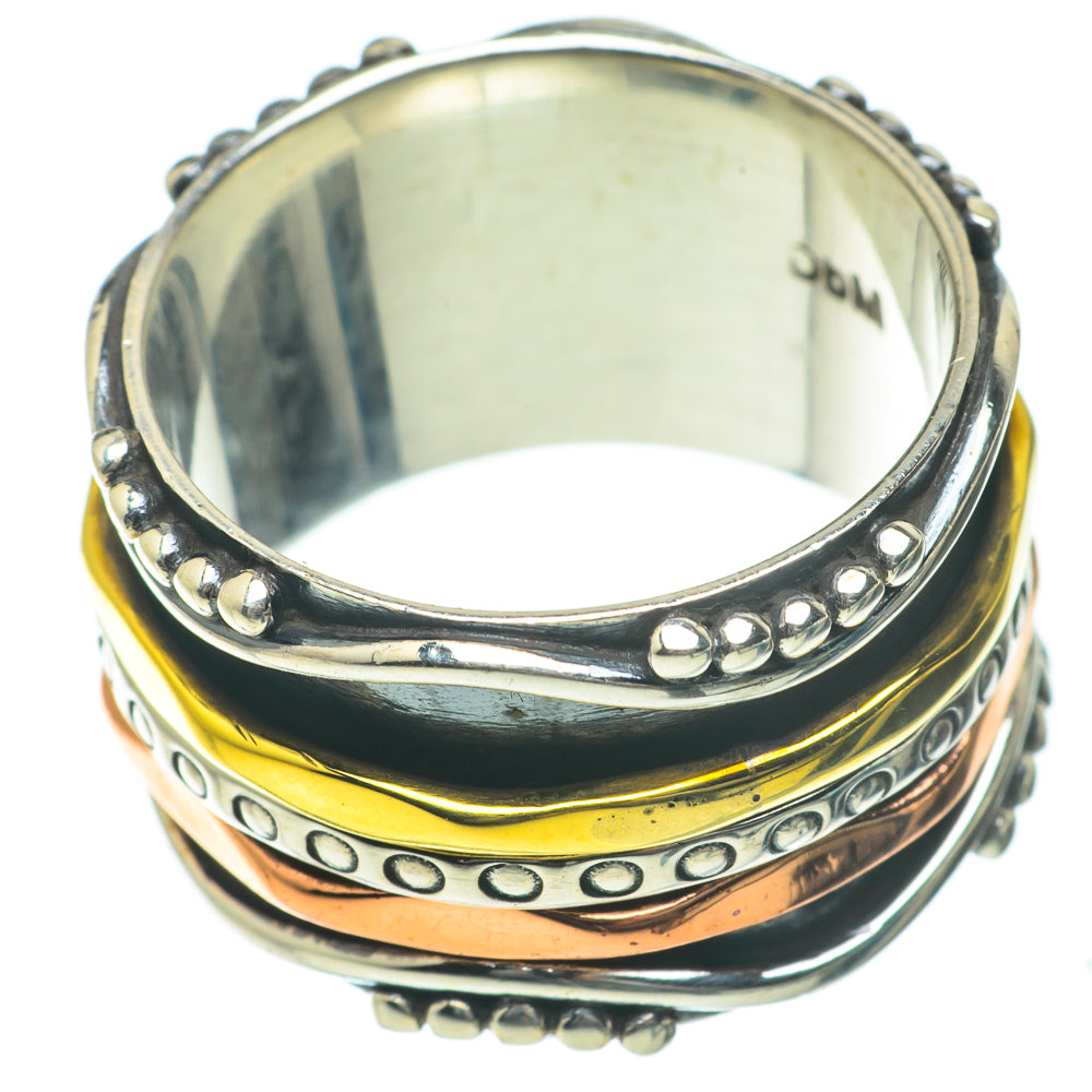 Multi-band metal ring with copper and silver tones, bead and oval stud edges
