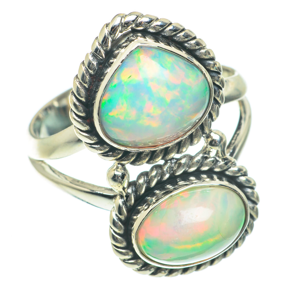 Sterling silver opal ring with raised oval opal cabochons and braided-edge bezels