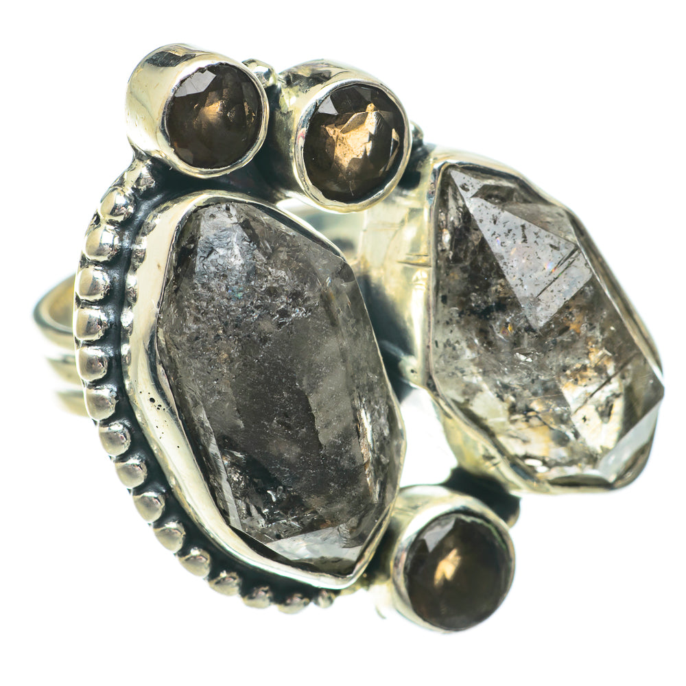 Sterling silver ring with smoky quartz oval, bezel-set faceted stones and dark side accents