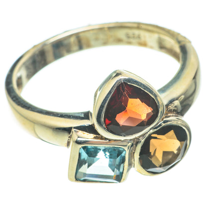 Sterling silver gemstone ring with red oval, blue square, and amber round stones