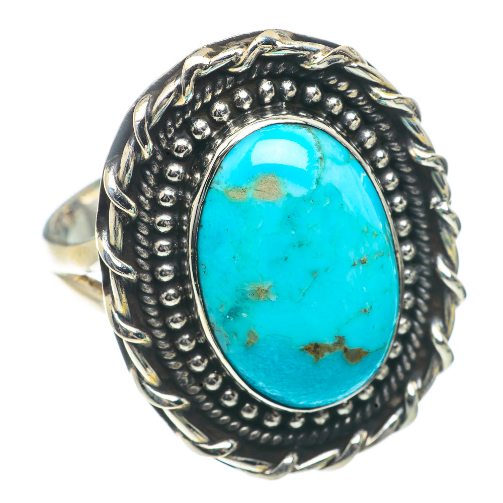 Oval turquoise gemstone silver ring with raised beaded border and rope-style setting