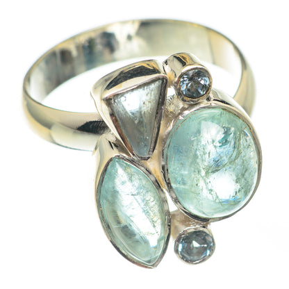 Sterling silver ring with three oval aqua gemstones and two round blue accents
