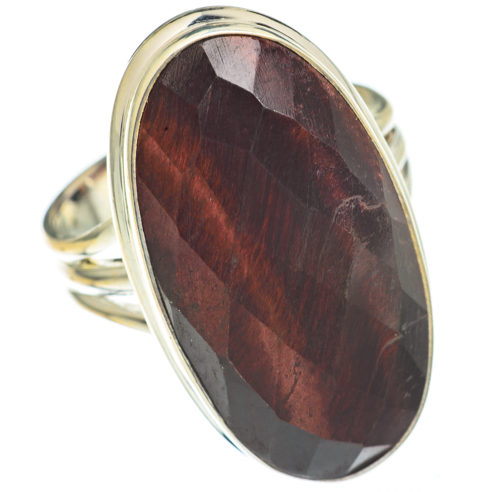 Oval red tiger eye ring with 925 sterling silver bezel and ring band, side view