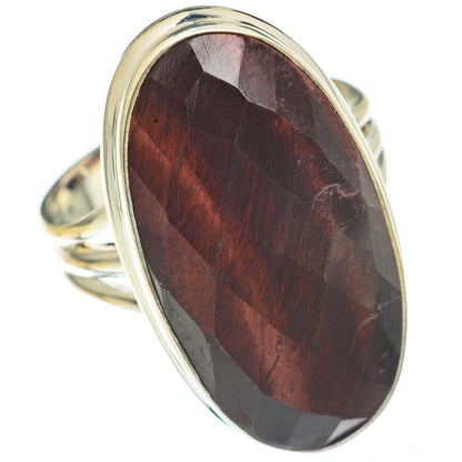 Oval red tiger eye ring with 925 sterling silver bezel and ring band, side view