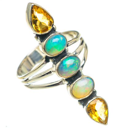 Sterling silver gemstone ring with three oval opal cabochons and citrine accents