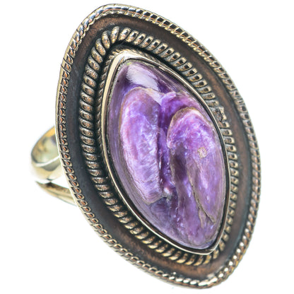 Charoite ring size 7 with oval purple cabochon, twisted rope sterling silver frame