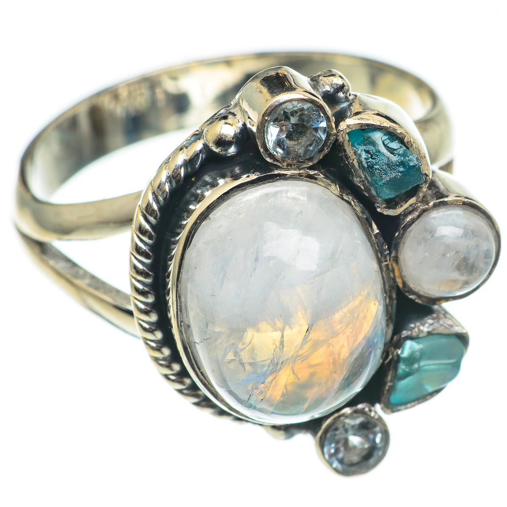 Sterling silver oval moonstone ring with teal and blue gemstones, bezel setting