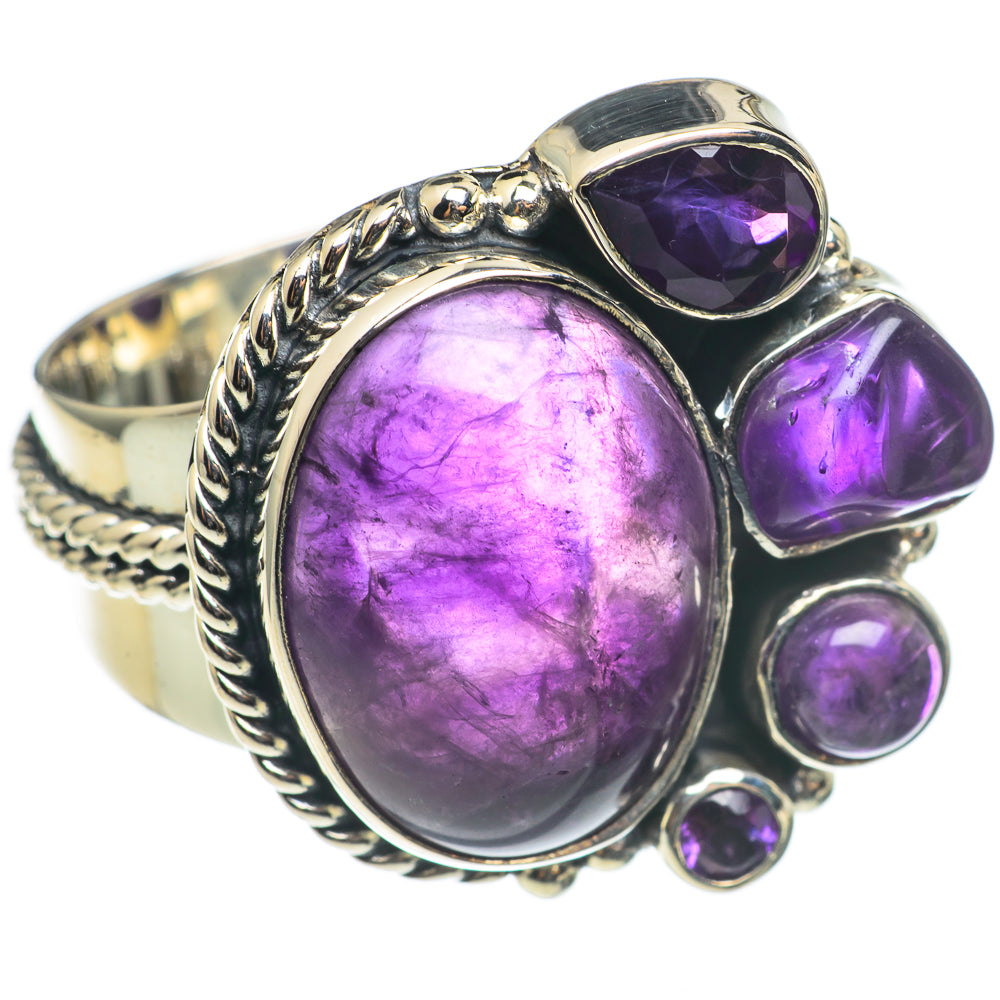 Sterling silver amethyst ring with large oval center stone and 4 small purple gems