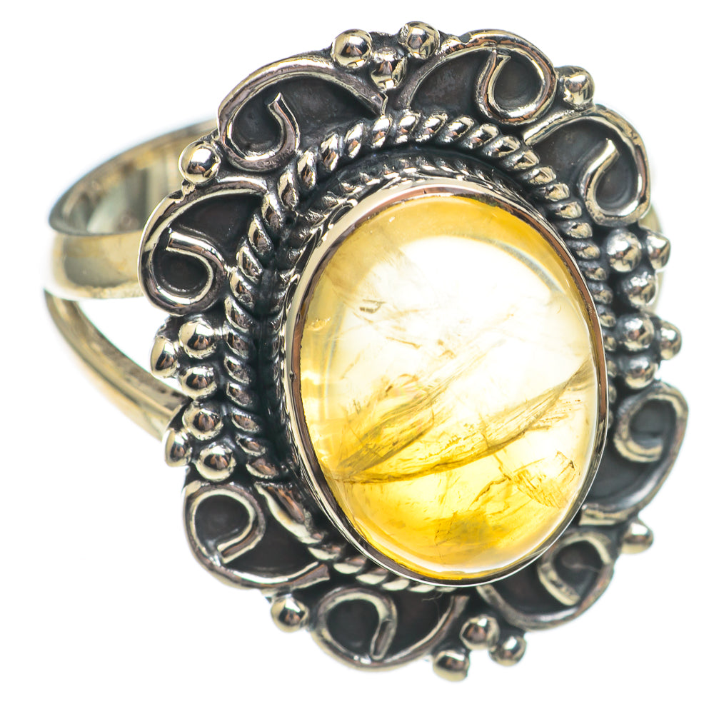 Oval yellow citrine gemstone set in an ornate 925 sterling silver ring, scalloped setting