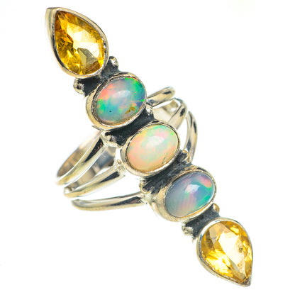 Sterling silver opal and citrine ring with three oval opals and two marquise citrine stones