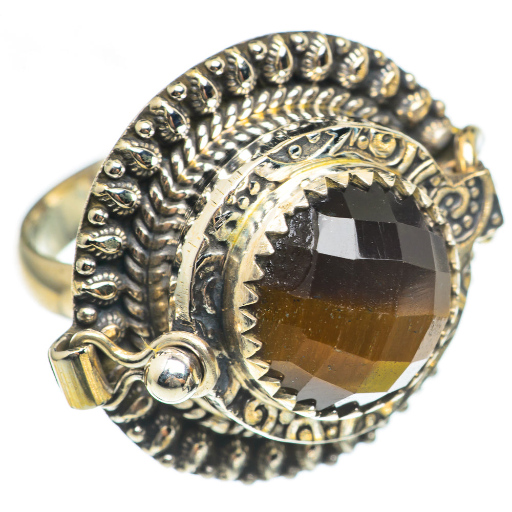 Ornate silver ring with large oval tiger eye gemstone, prong-set halo with filigree