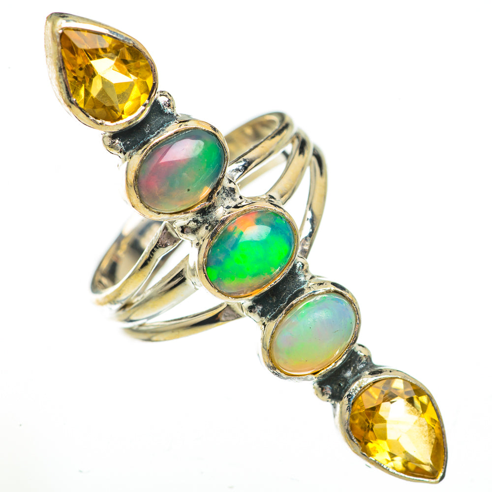 Silver opal and peridot ring with four oval opal stones and two marquise yellow gems
