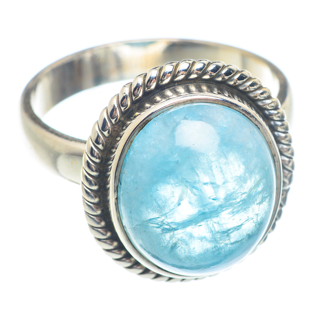 Aquamarine oval ring on sterling silver band with raised bead setting