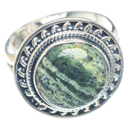Sterling silver ring with oval green jasper cabochon and detailed rope-edge setting