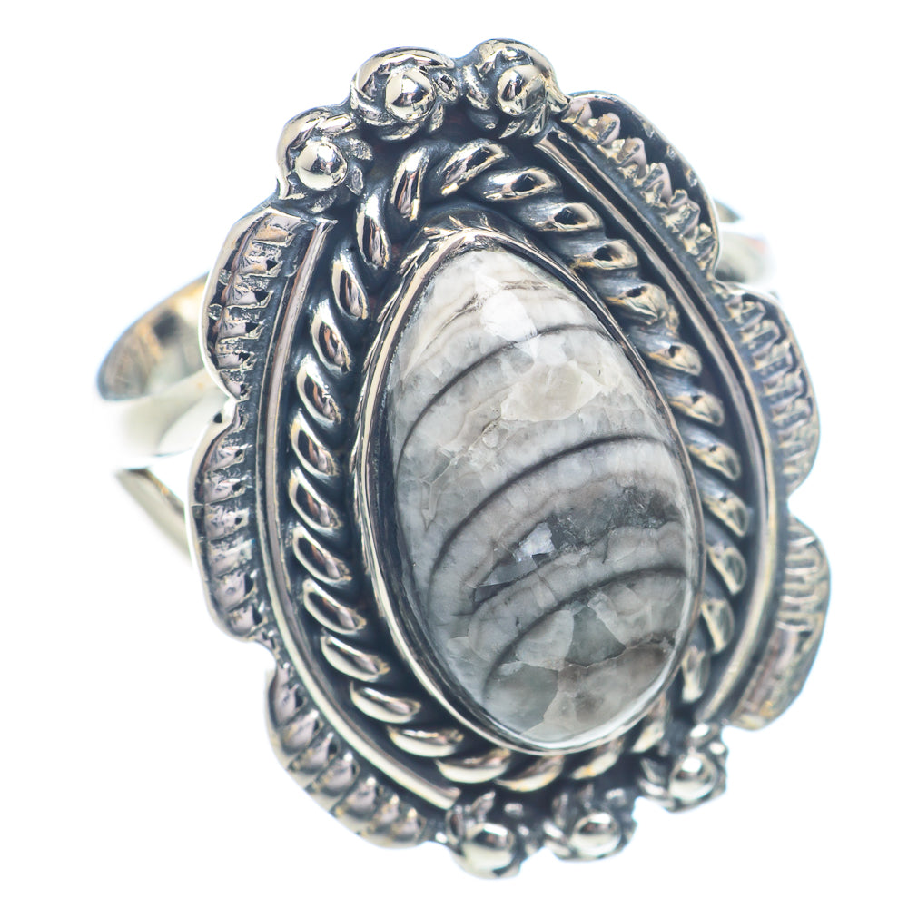 925 sterling silver oval fossil ring with ornate bezel and carved band