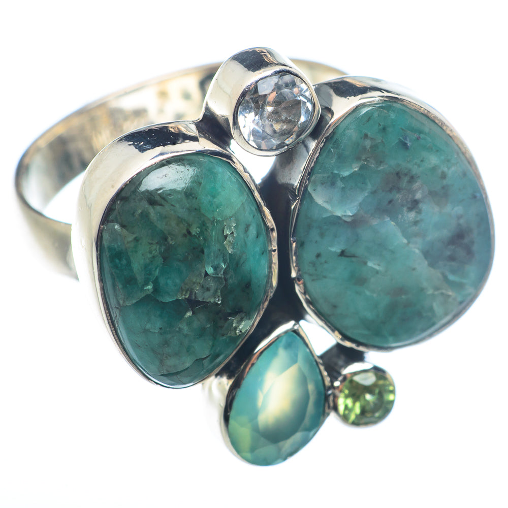 Sterling silver ring with large oval green stone, oval dark green stone, and small round accents