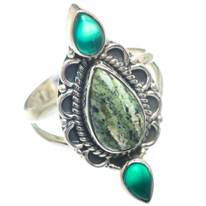 Sterling silver ring with green teardrop and oval gemstone settings